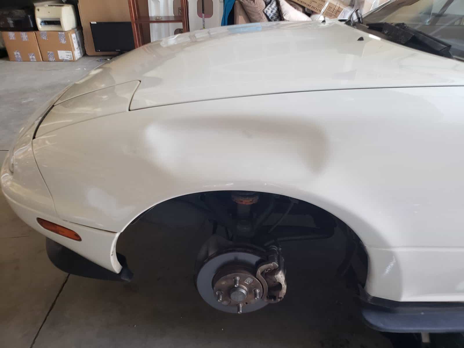 Large fender smash in Mazda Miata