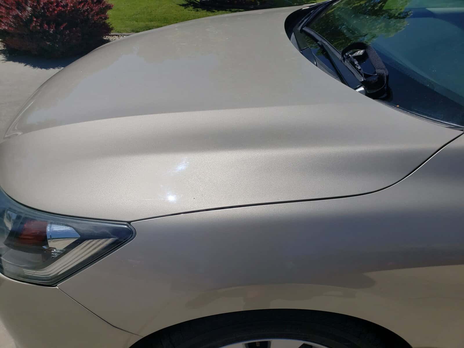 Large body line dent in hood of Honda Accord restored with paintless dent repair PDR
