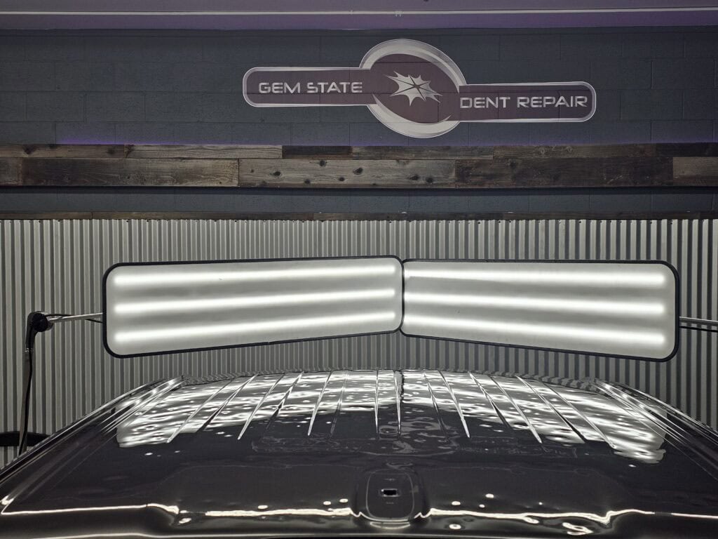 hail dents on roof of truck being repaired